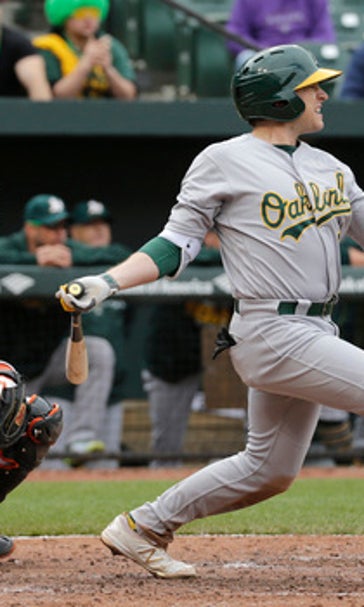A's beat Orioles 8-4 in doubleheader opener to end skid